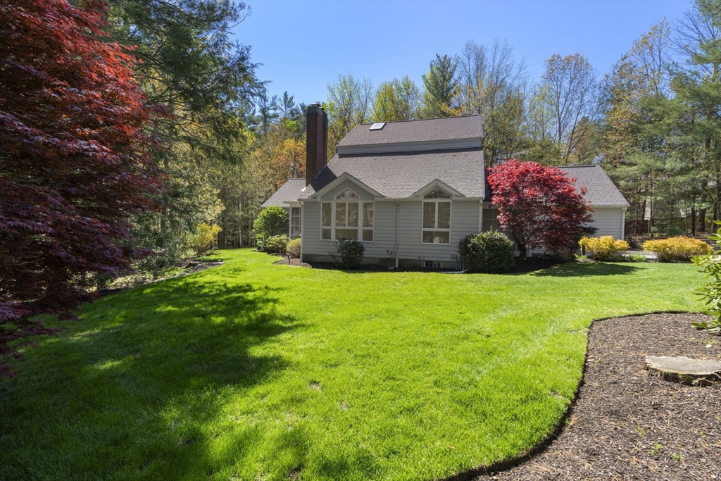60 Whisper Drive Worcester, MA 01609 - Photo 38 of 39 a front view of house with garden