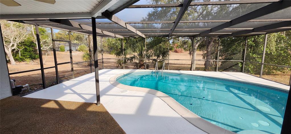 7452 Philatelic Drive Spring Hill, FL 34606 - Photo 5 of 45 a view of a porch