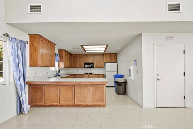 a view of a house with swimming pool