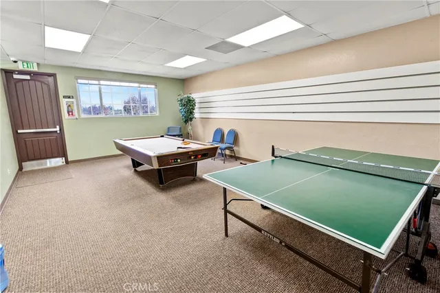 a kitchen that has a sink and a stove