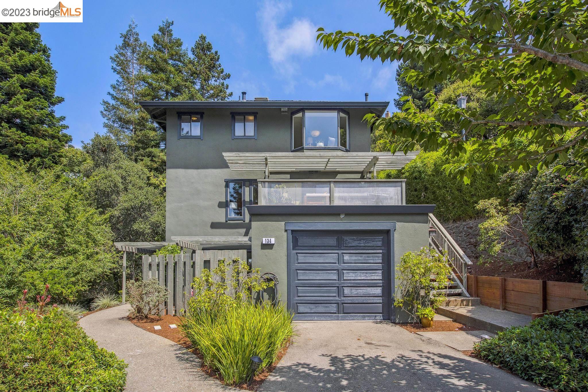 front view of a house with a small yard