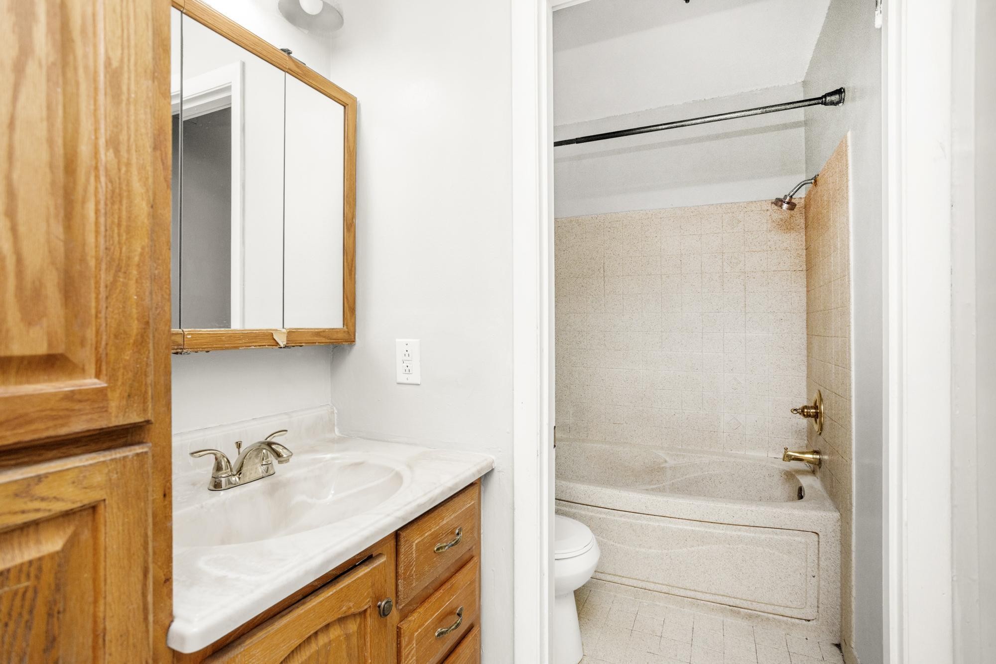 323 Forest Park Road Madison, TN 37115 - Photo 12 of 22 a bathroom with a granite countertop sink toilet and shower