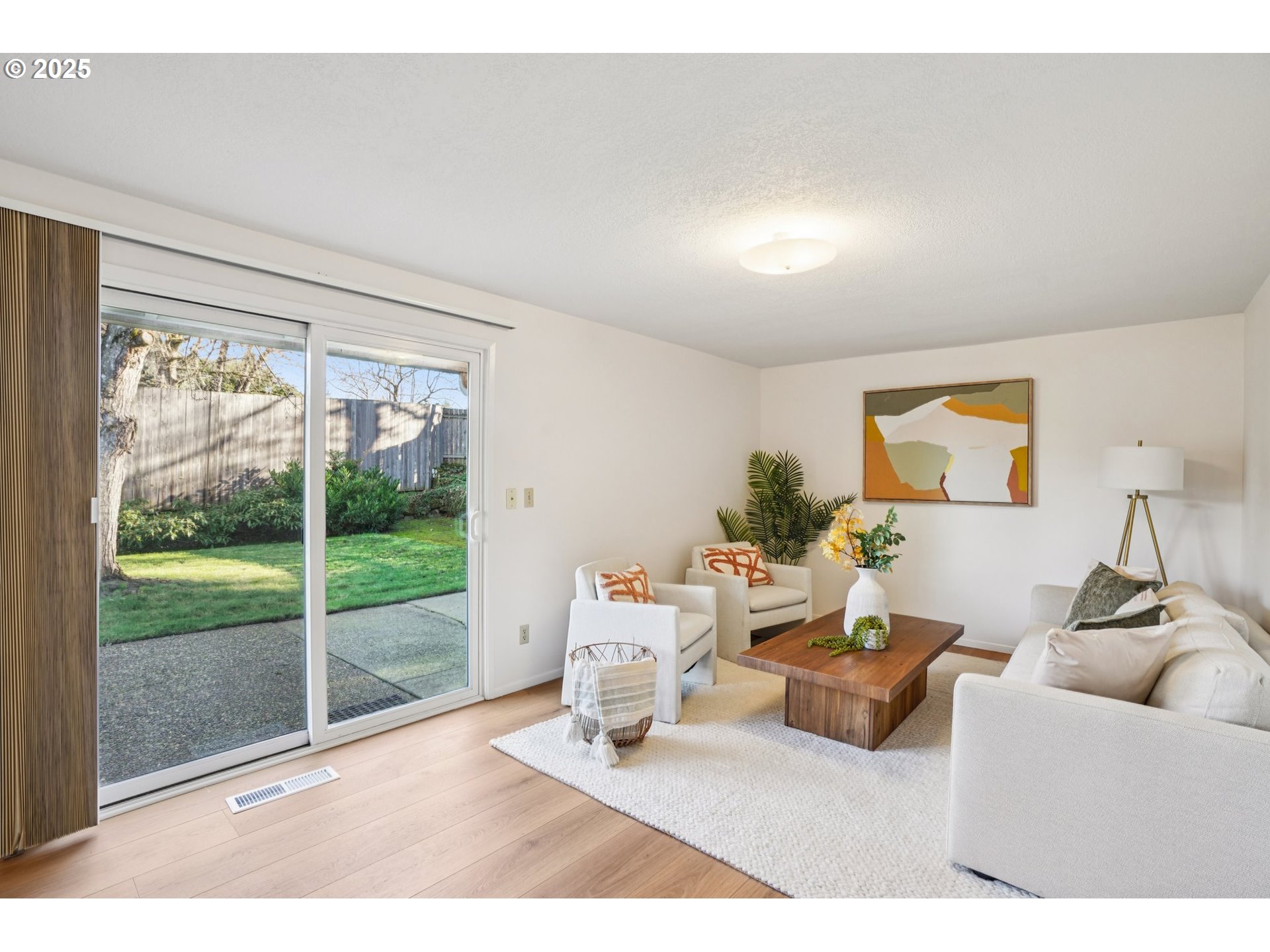 1208 Southeast 209th Avenue Gresham, OR 97030 - Photo 12 of 24 a living room with furniture and a large window