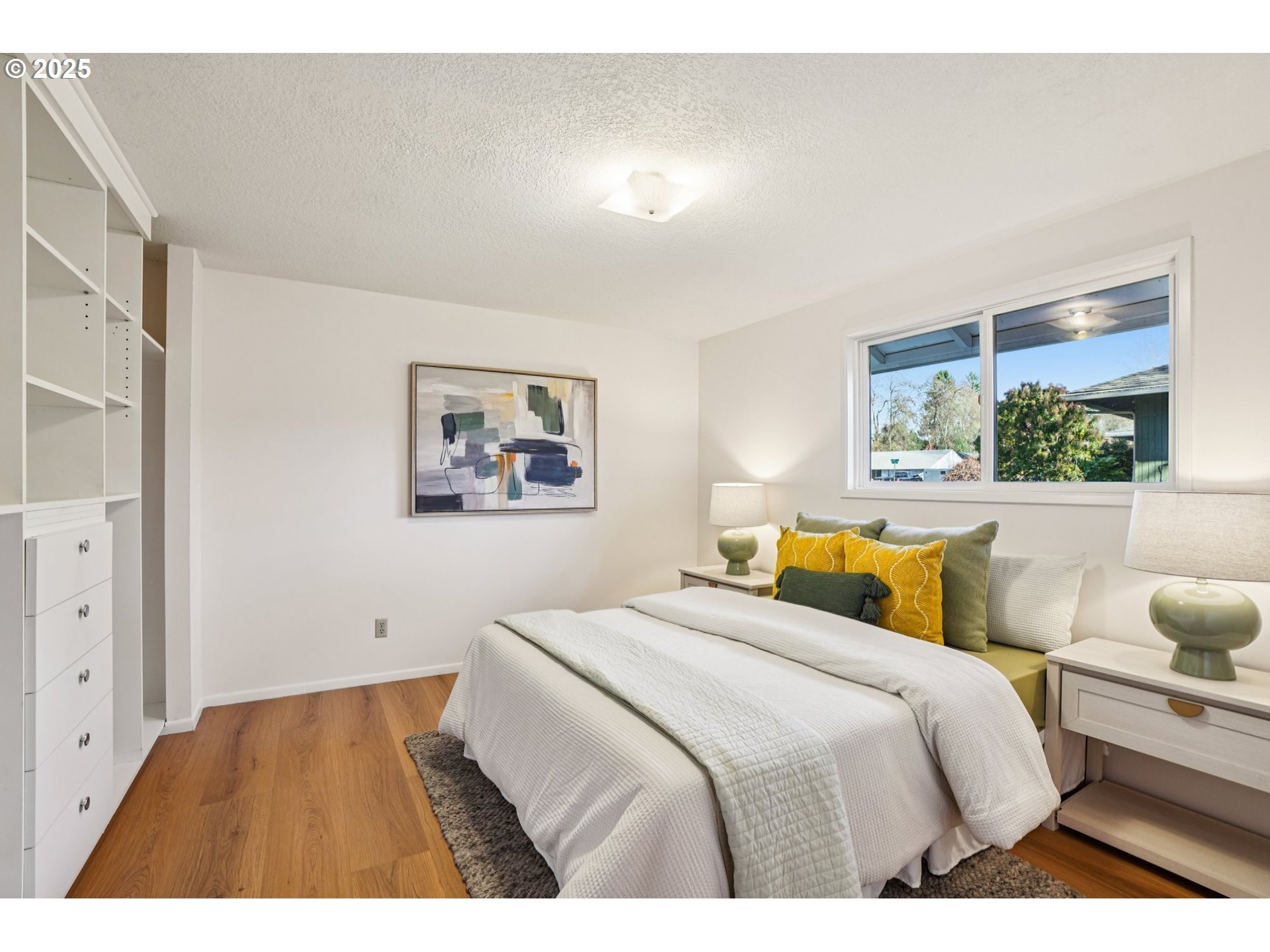 1208 Southeast 209th Avenue Gresham, OR 97030 - Photo 14 of 24 a bedroom with a bed and a large window