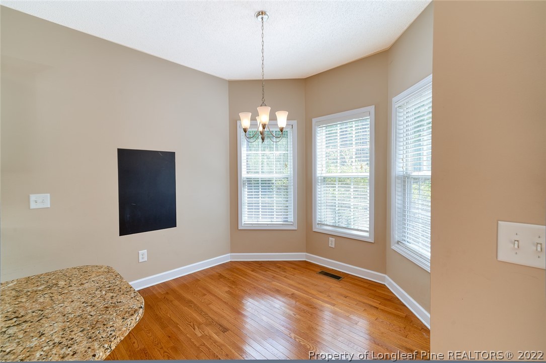 60 Spring Lake Drive Pinehurst, NC 28374 - Photo 15 of 38 a bedroom with a bed and a window