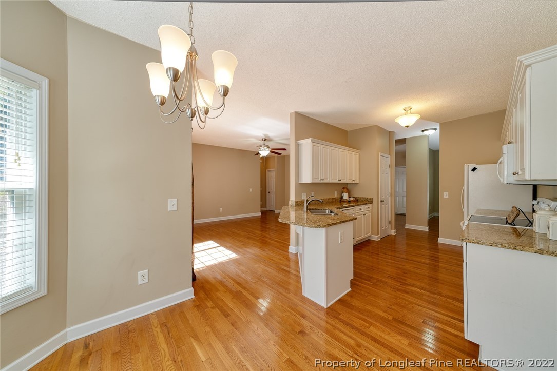 60 Spring Lake Drive Pinehurst, NC 28374 - Photo 16 of 38 a kitchen with a sink cabinets and window