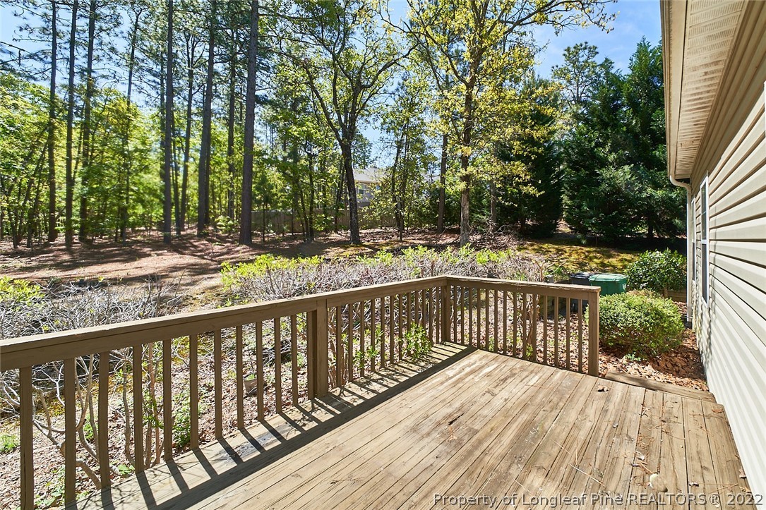 60 Spring Lake Drive Pinehurst, NC 28374 - Photo 33 of 38 a view of a wooden roof deck