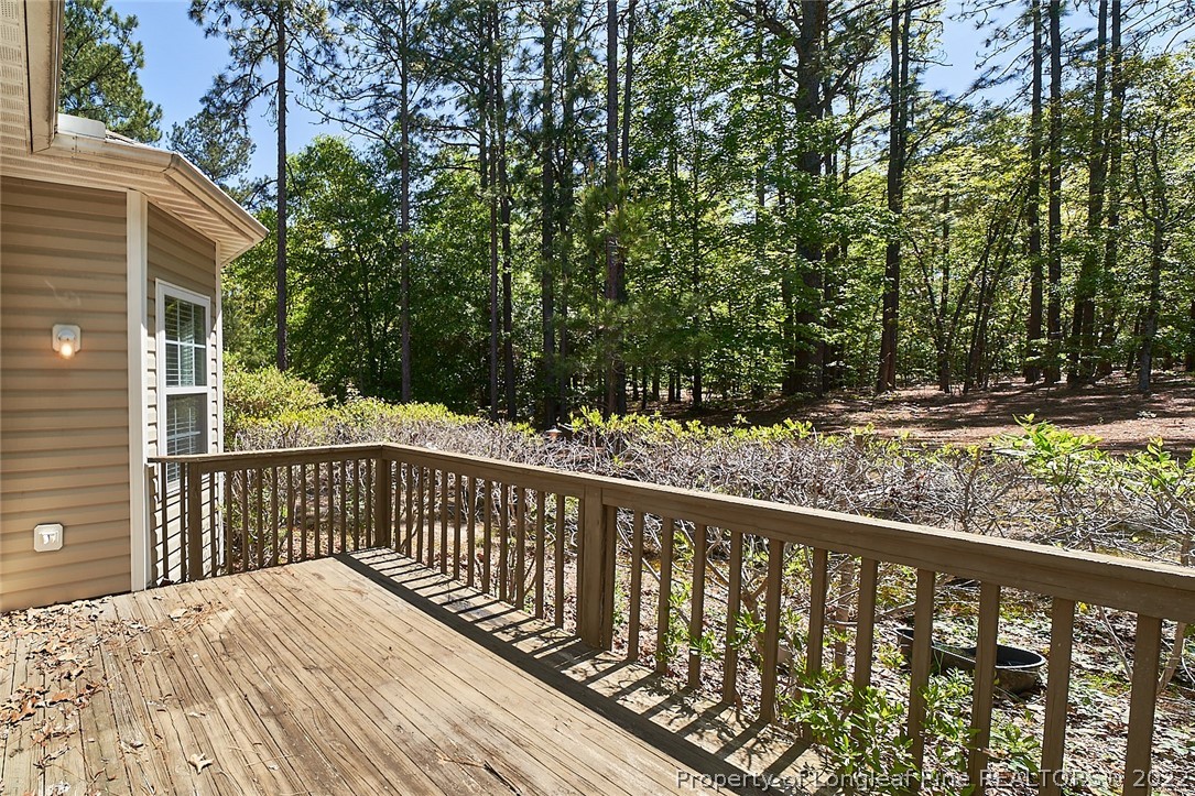 60 Spring Lake Drive Pinehurst, NC 28374 - Photo 34 of 38 a view of a wooden street from a balcony