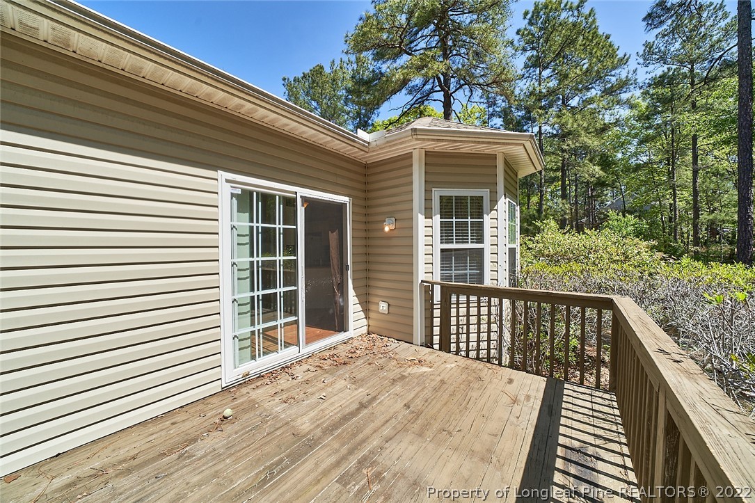 60 Spring Lake Drive Pinehurst, NC 28374 - Photo 35 of 38 a view of a wooden balcony