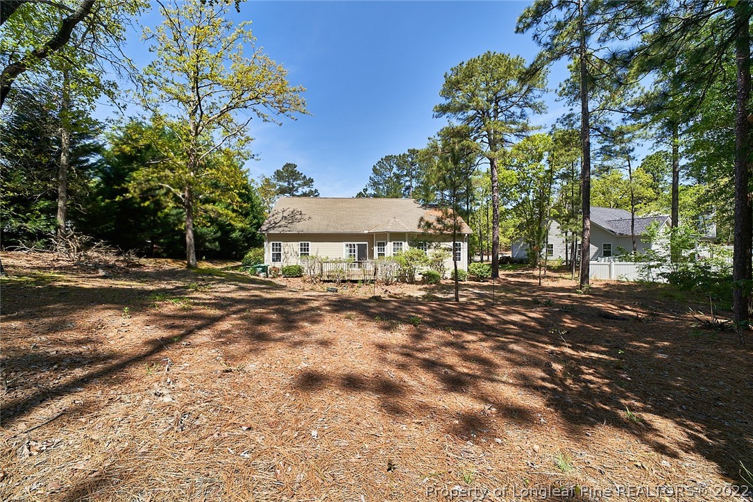 60 Spring Lake Drive Pinehurst, NC 28374 - Photo 36 of 38 a view of a house with a yard