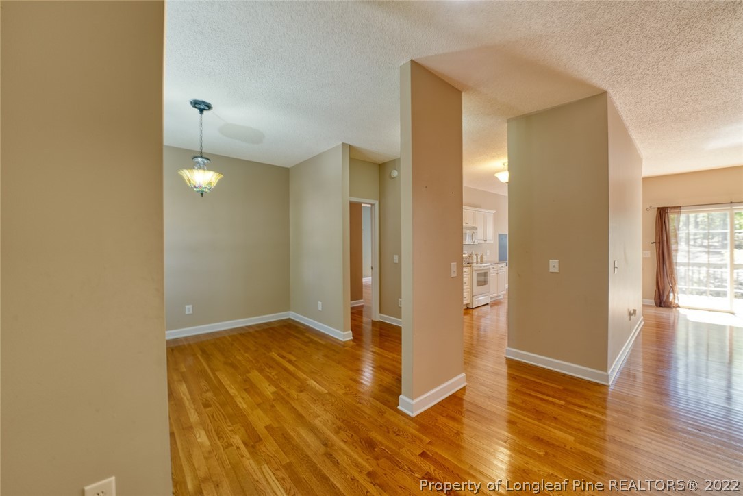 60 Spring Lake Drive Pinehurst, NC 28374 - Photo 9 of 38 wooden floor in an empty room