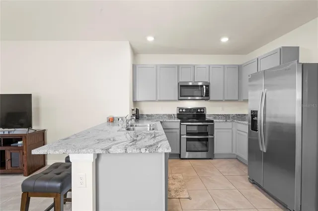 a bedroom with a bed and closet