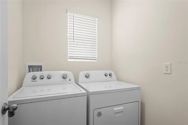 a view of a chairs and tables in the patio