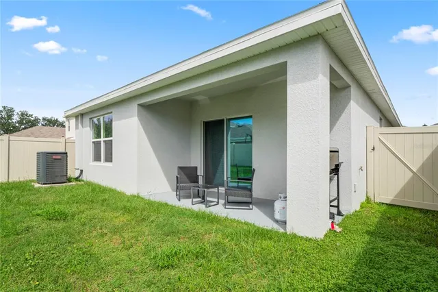 a view of a park with slide and swing