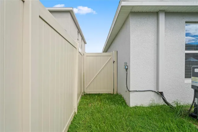 an aerial view of a house with a garden