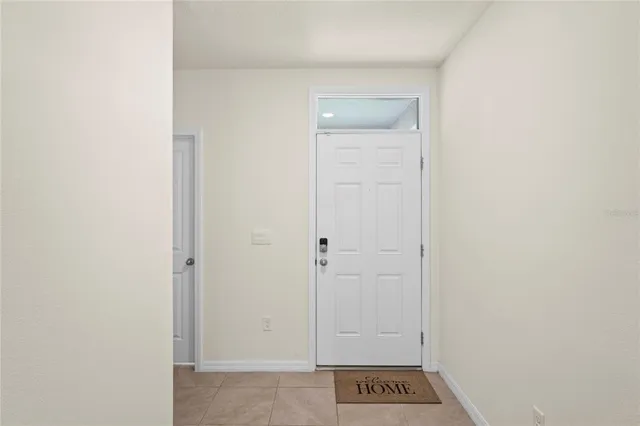 a kitchen with kitchen island granite countertop stainless steel appliances cabinets a sink and a island