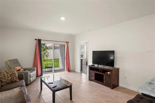 a kitchen with sink and a window