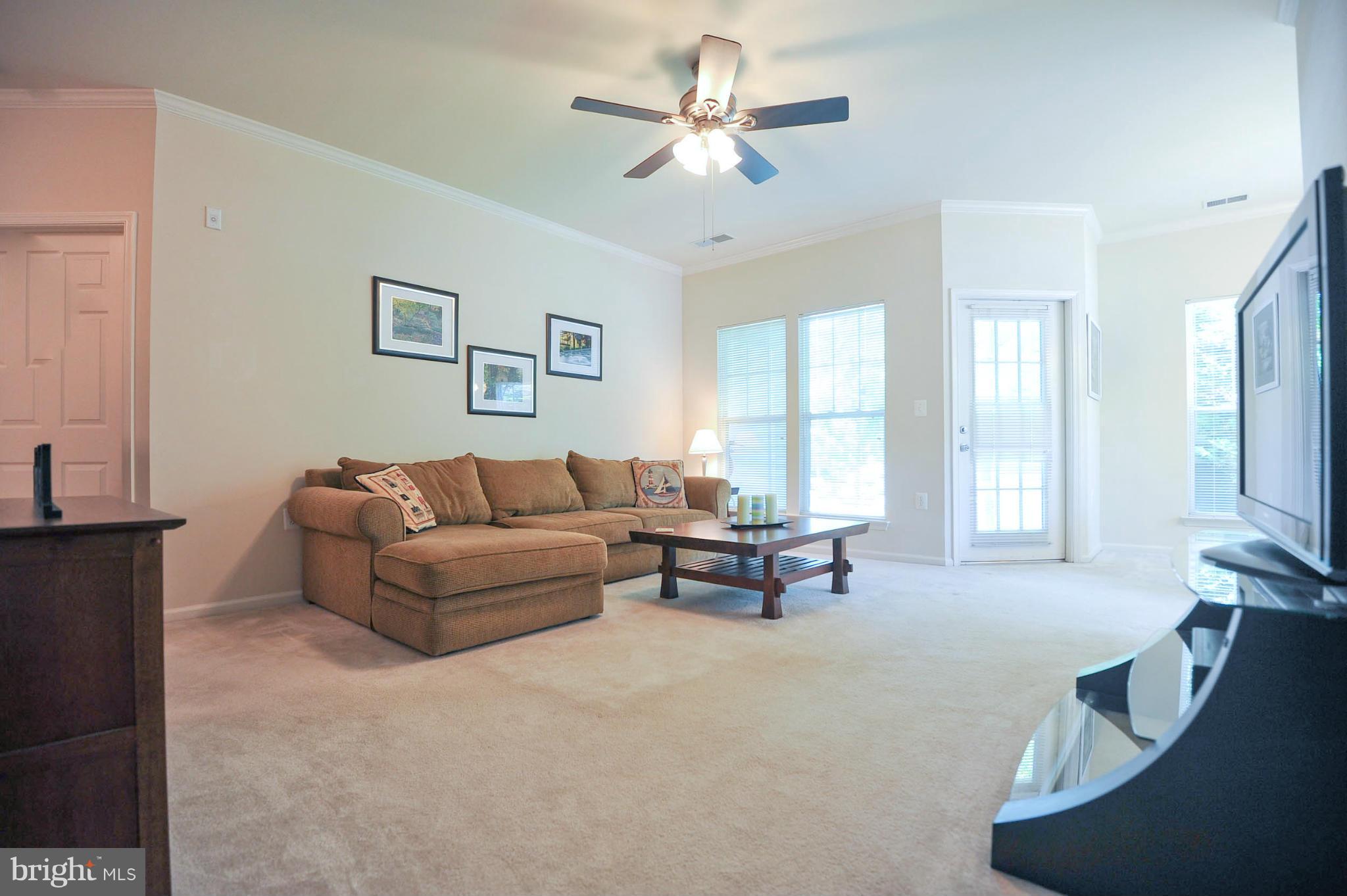 1515 North Point Drive, Unit 102 Reston, VA 20194 - Photo 6 of 28 Living Room 1