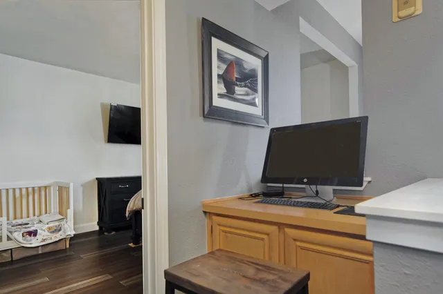 a view of workspace with wooden floor outdoor space