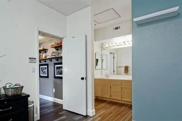 a bathroom with a sink and mirror