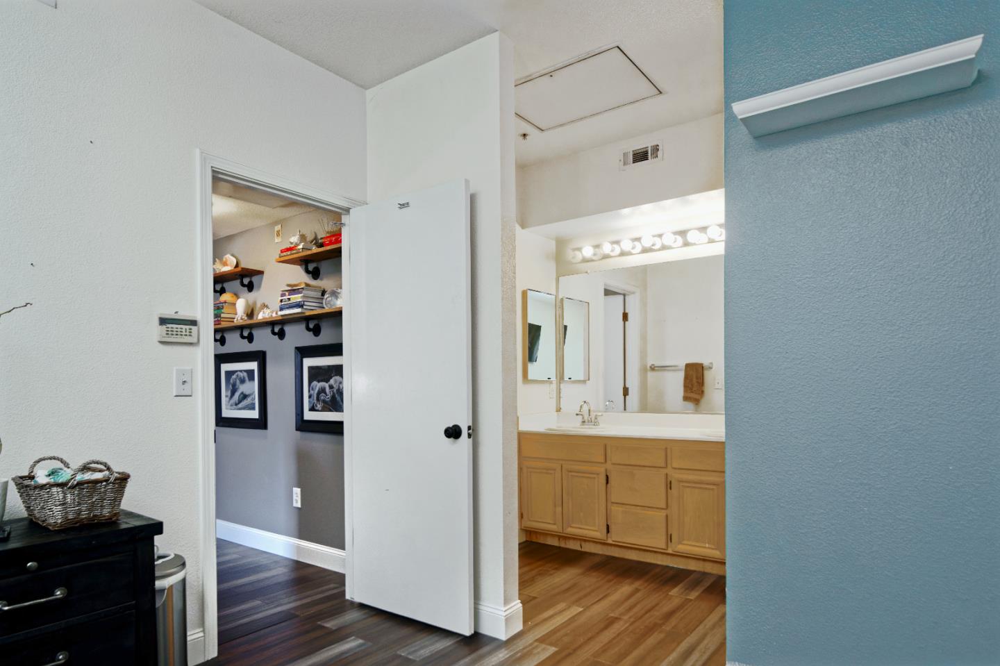 1021 Chagall Way San Jose, CA 95138 - Photo 18 of 25 a bathroom with a sink and mirror