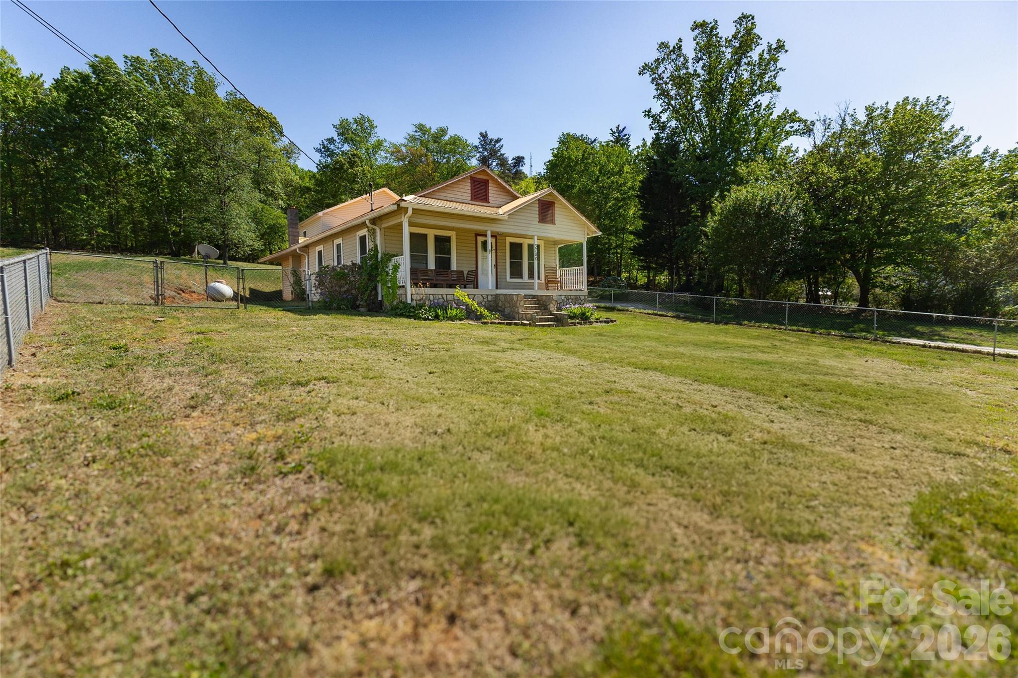 3780 Cook Road Valdese, NC 28690 - Photo 2 of 47 a front view of a house with yard and green space