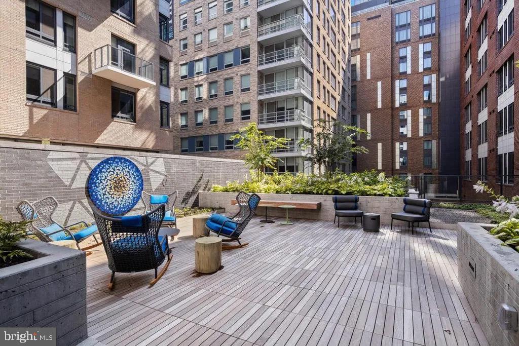 70 N Street Southeast, Unit 211 Washington, DC 20003 - Photo 16 of 17 a view of a chairs and table in a patio