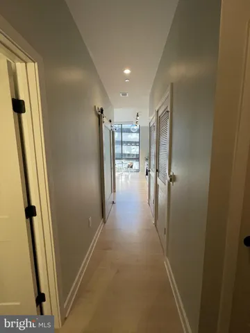 a view of hallway with stairs