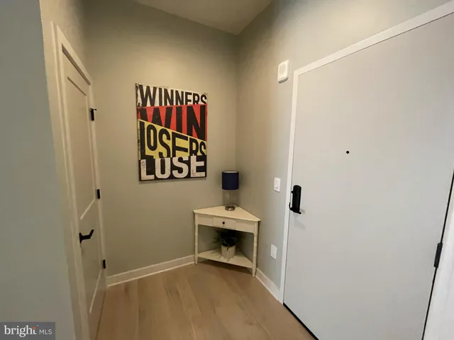 a view of a hallway with entryway