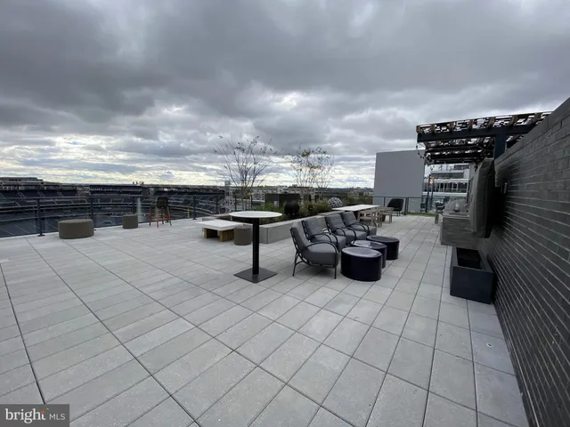a roof view with table and chairs