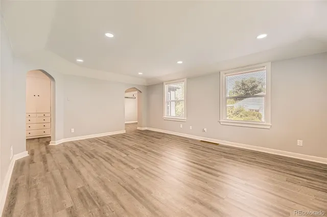 a view of an empty room and window