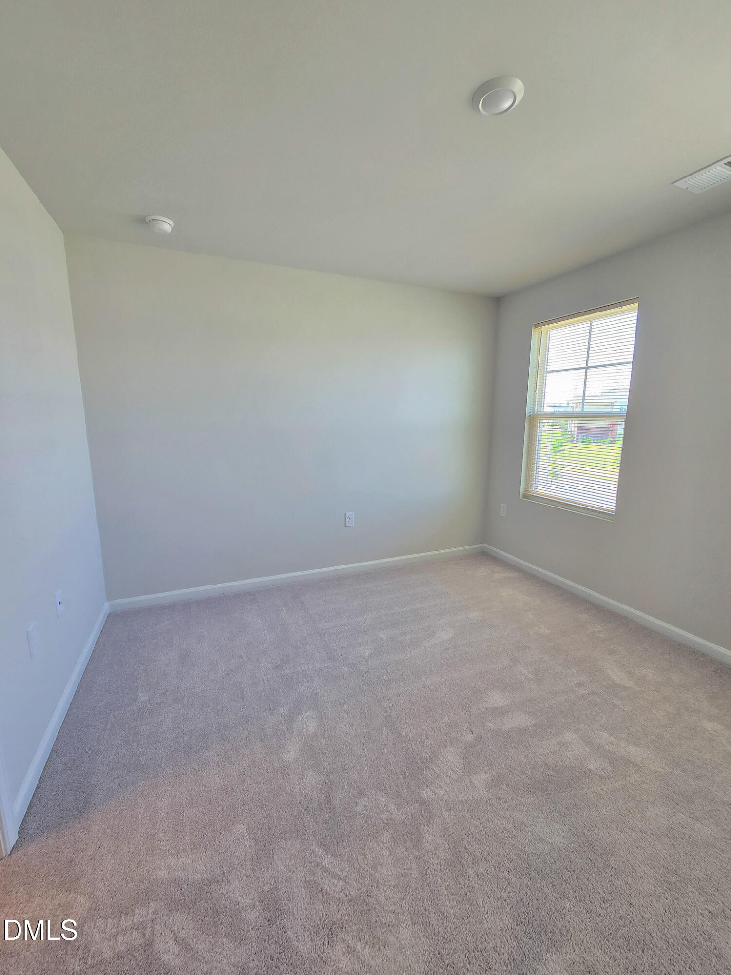 2431 Kasota Lane Raleigh, NC 27610 - Photo 36 of 46 an empty room with windows