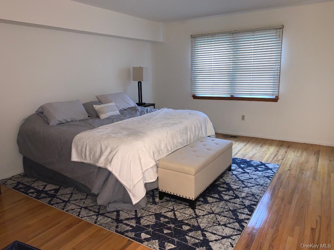 135 West Nyack Road, Unit 51 Nanuet, NY 10954 - Photo 8 of 16 Huge primary bedroom has beautful wood floors and 2 double closets.