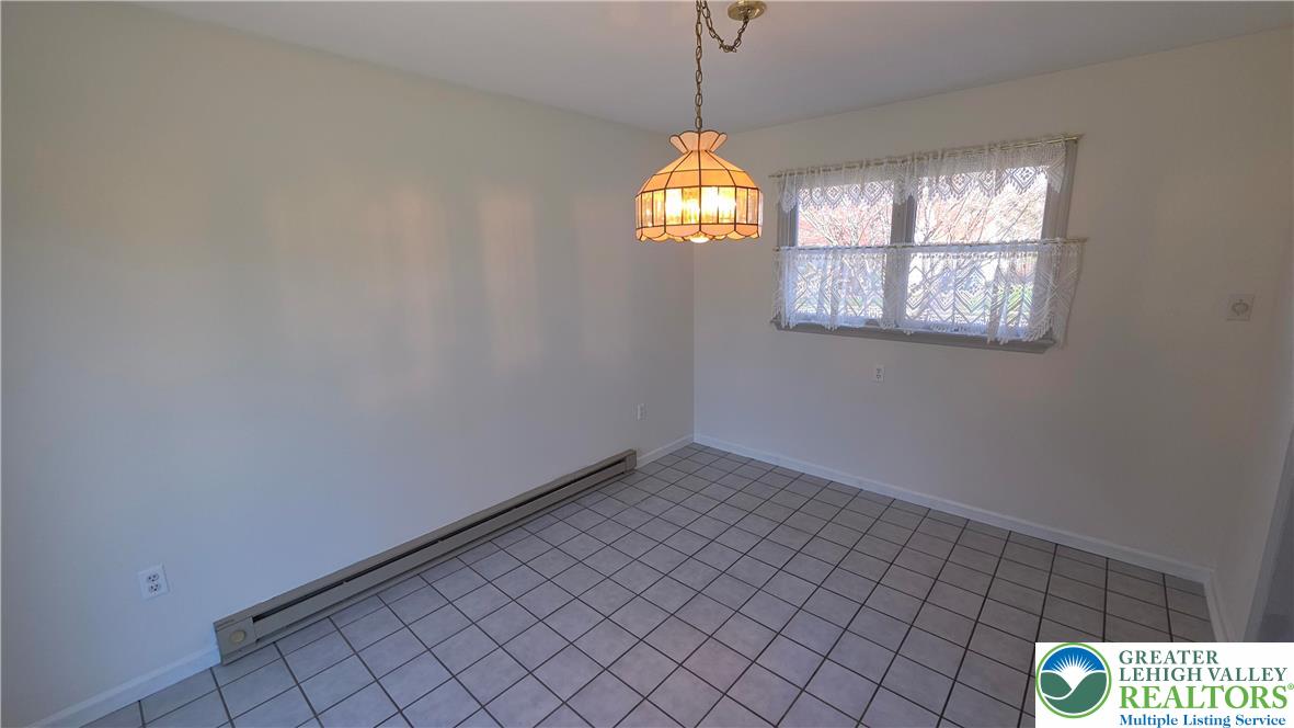 522 Rentzheimer Drive Hellertown, PA 18055 - Photo 37 of 57 a view of an entryway with window and chandelier