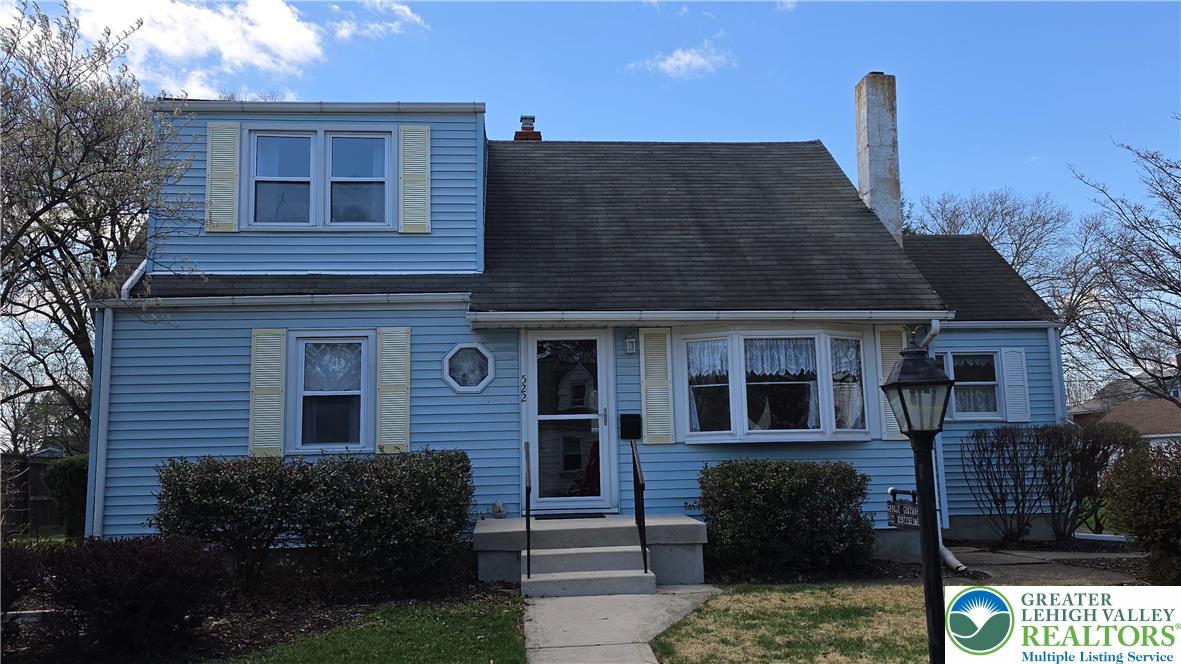 522 Rentzheimer Drive Hellertown, PA 18055 - Photo 4 of 57 a front view of a house with garden