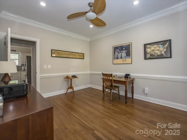a view of a workspace with furniture