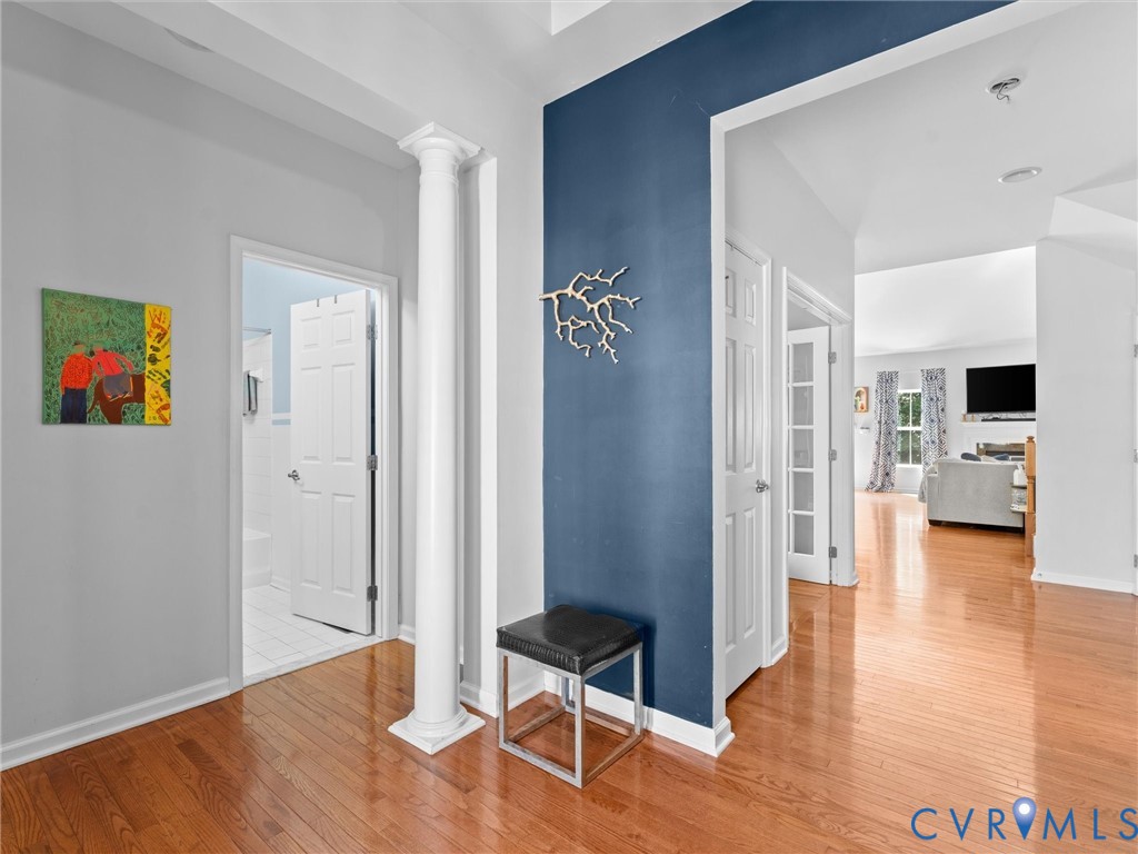 7434 South Franklins Way Quinton, VA 23141 - Photo 3 of 31 Entryway featuring wood-finish flooring, a decorat