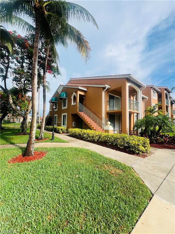 1275 Wildwood Lakes Boulevard, Unit 202 Naples, FL 34104 - Photo 1 of 16