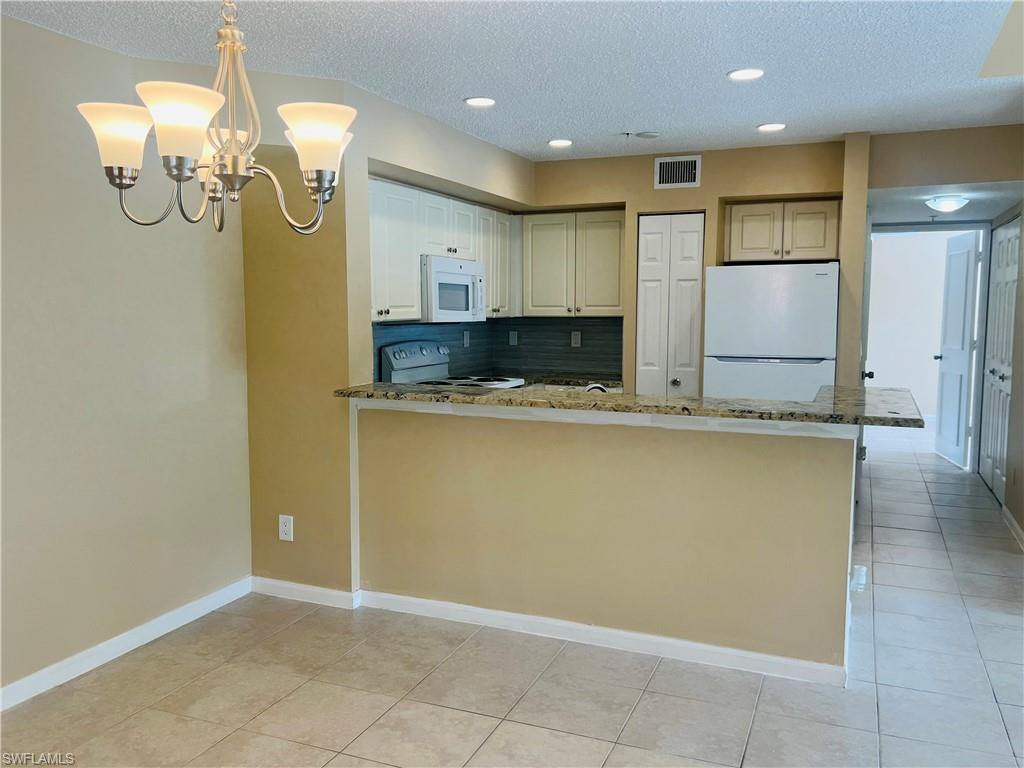 1275 Wildwood Lakes Boulevard, Unit 202 Naples, FL 34104 - Photo 5 of 16