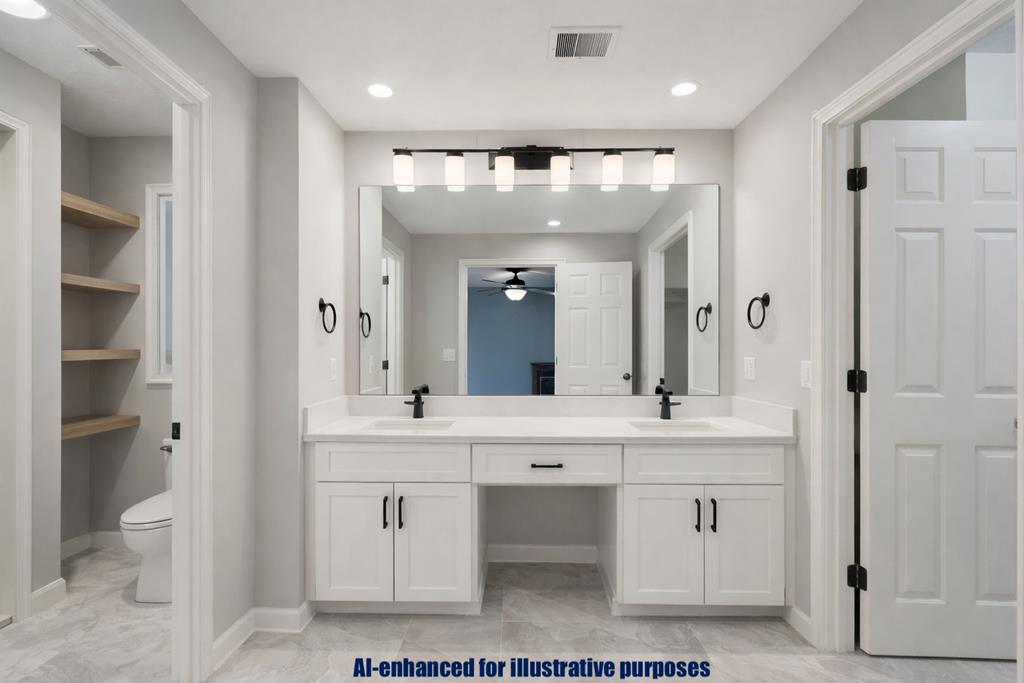 233 Ga Highway Fortson, GA 31808 - Photo 32 of 74 a large bathroom with a double vanity sink a toilet and a mirror