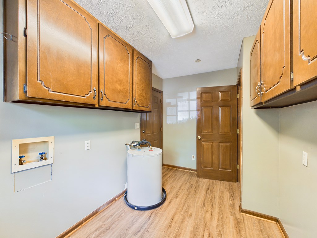 233 Ga Highway Fortson, GA 31808 - Photo 45 of 74 a view of kitchen with furniture and wooden floor