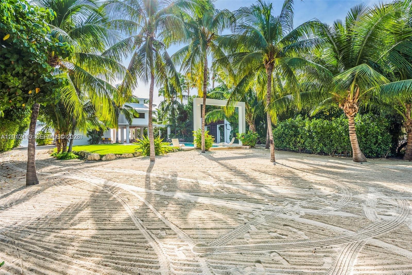 60 Ocean Front Drive Key Largo, FL 33037 - Photo 28 of 85 a view of small space with palm trees