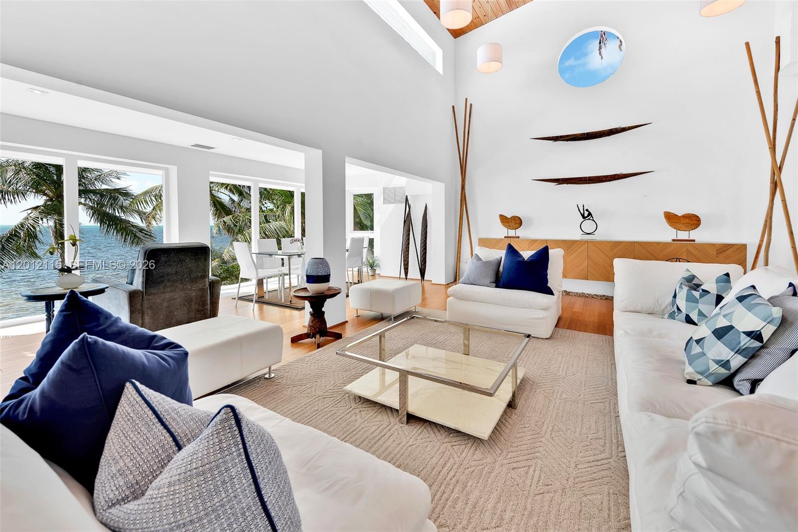 60 Ocean Front Drive Key Largo, FL 33037 - Photo 41 of 85 a living room with furniture or couch and a fireplace