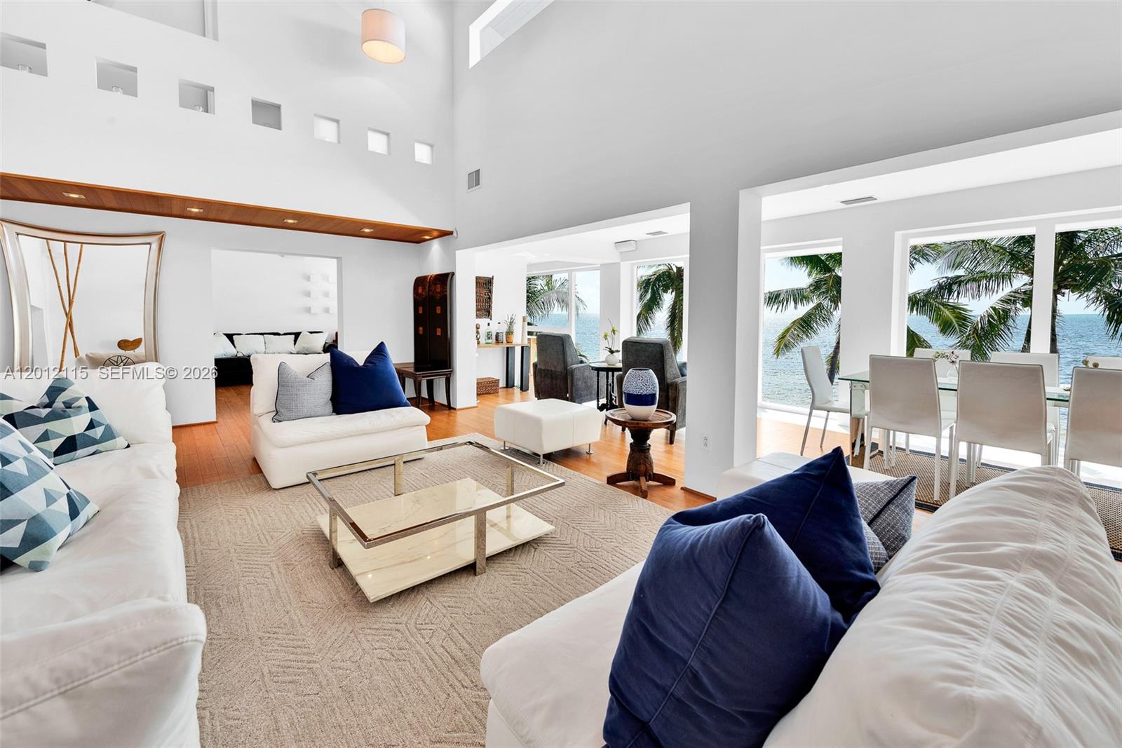 60 Ocean Front Drive Key Largo, FL 33037 - Photo 43 of 85 a living room with furniture and a large window