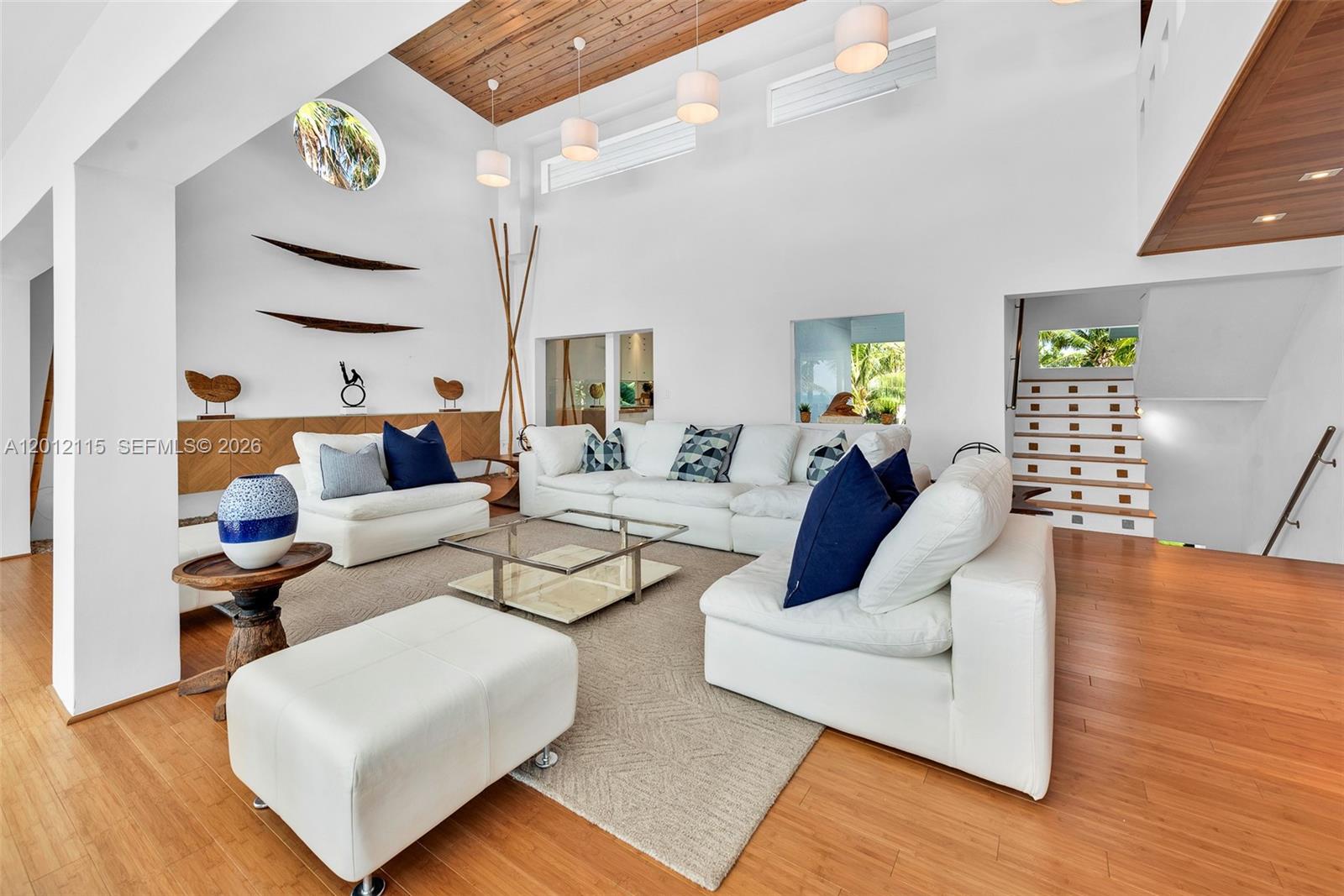 60 Ocean Front Drive Key Largo, FL 33037 - Photo 54 of 85 a living room with furniture and wooden floor