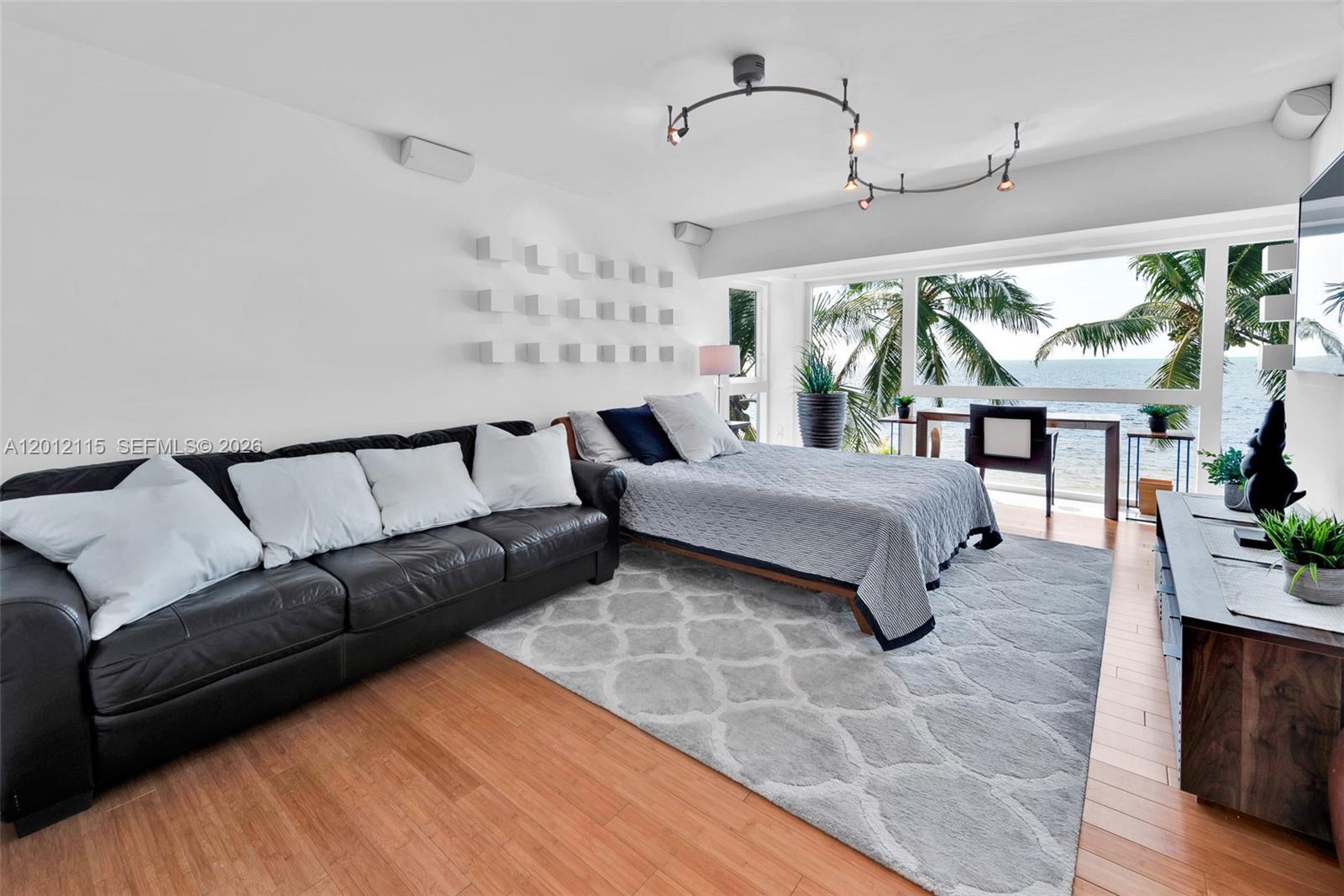 60 Ocean Front Drive Key Largo, FL 33037 - Photo 60 of 85 a living room with furniture and a large window
