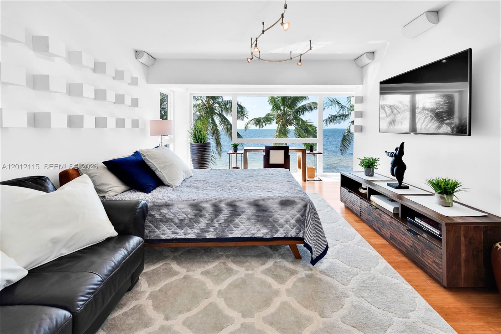 60 Ocean Front Drive Key Largo, FL 33037 - Photo 61 of 85 a living room with furniture and a flat screen tv
