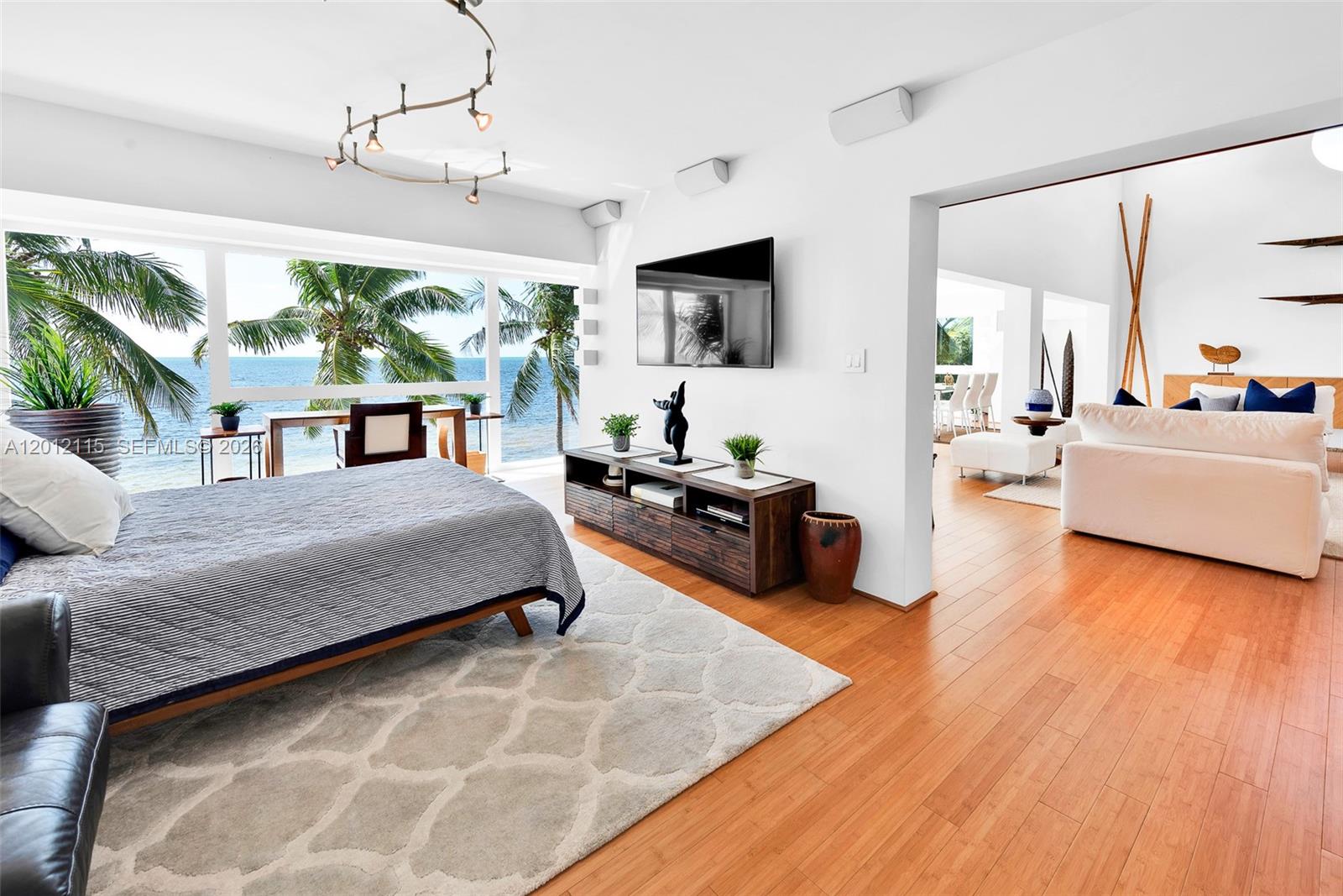 60 Ocean Front Drive Key Largo, FL 33037 - Photo 62 of 85 a living room with furniture and a flat screen tv