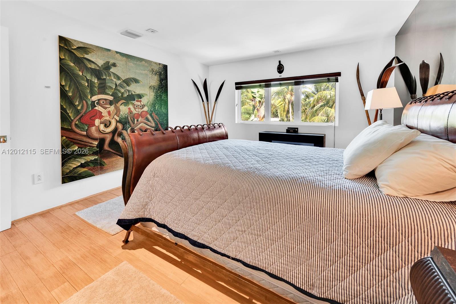 60 Ocean Front Drive Key Largo, FL 33037 - Photo 69 of 85 a bedroom with a bed and window