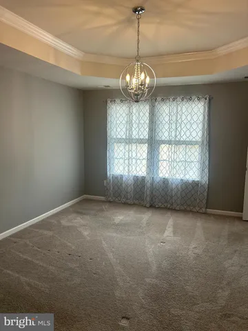 a bathroom with a double vanity sink mirror and toilet